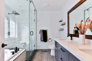 a muted navy blue vanity in a modern bathroom